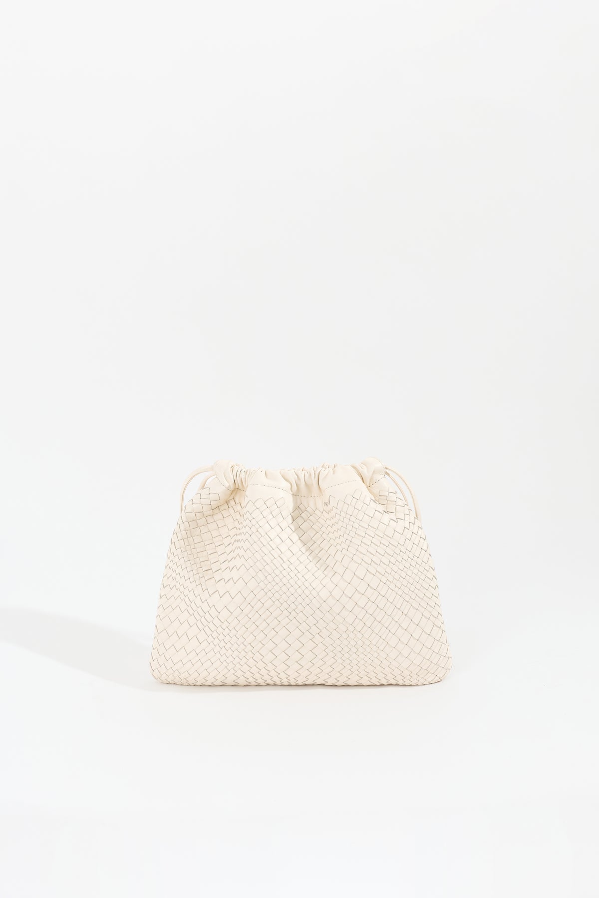 ANYA handwoven nappa leather drawstring bag in Chalk by Narii