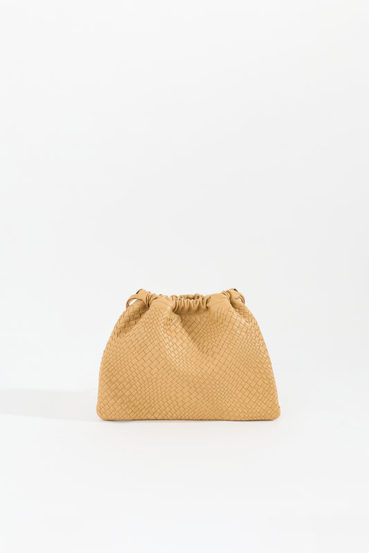 ANYA handwoven nappa leather drawstring bag in Sand by Narii